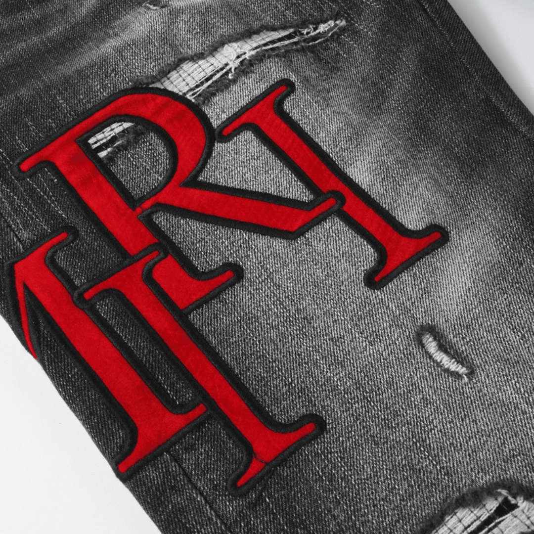 Amr Staggered Red Logo Jeans