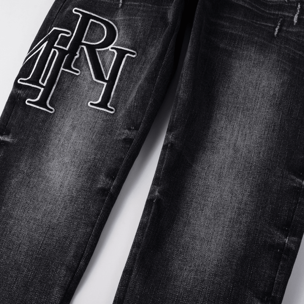 Amr Staggered Black Jeans