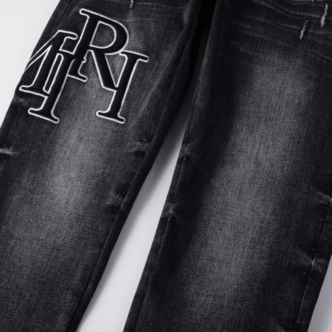 Amr Staggered Black Jeans