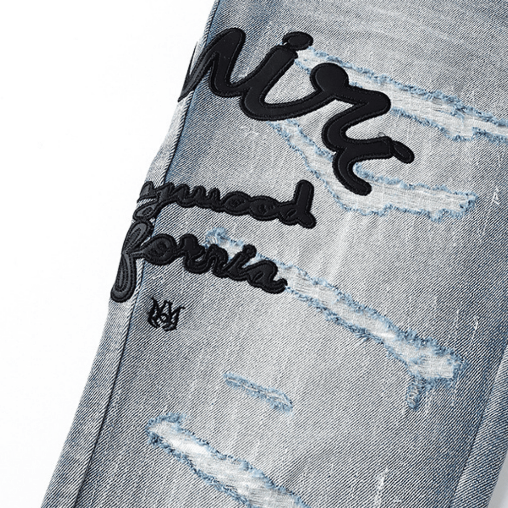 Amr Logo Staggered Jeans