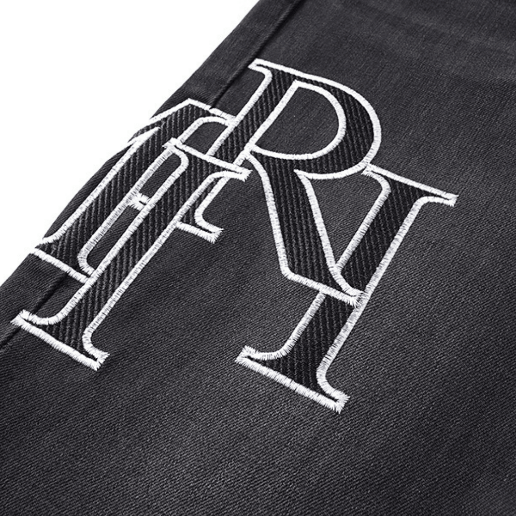 Amr Staggered Logo Jeans